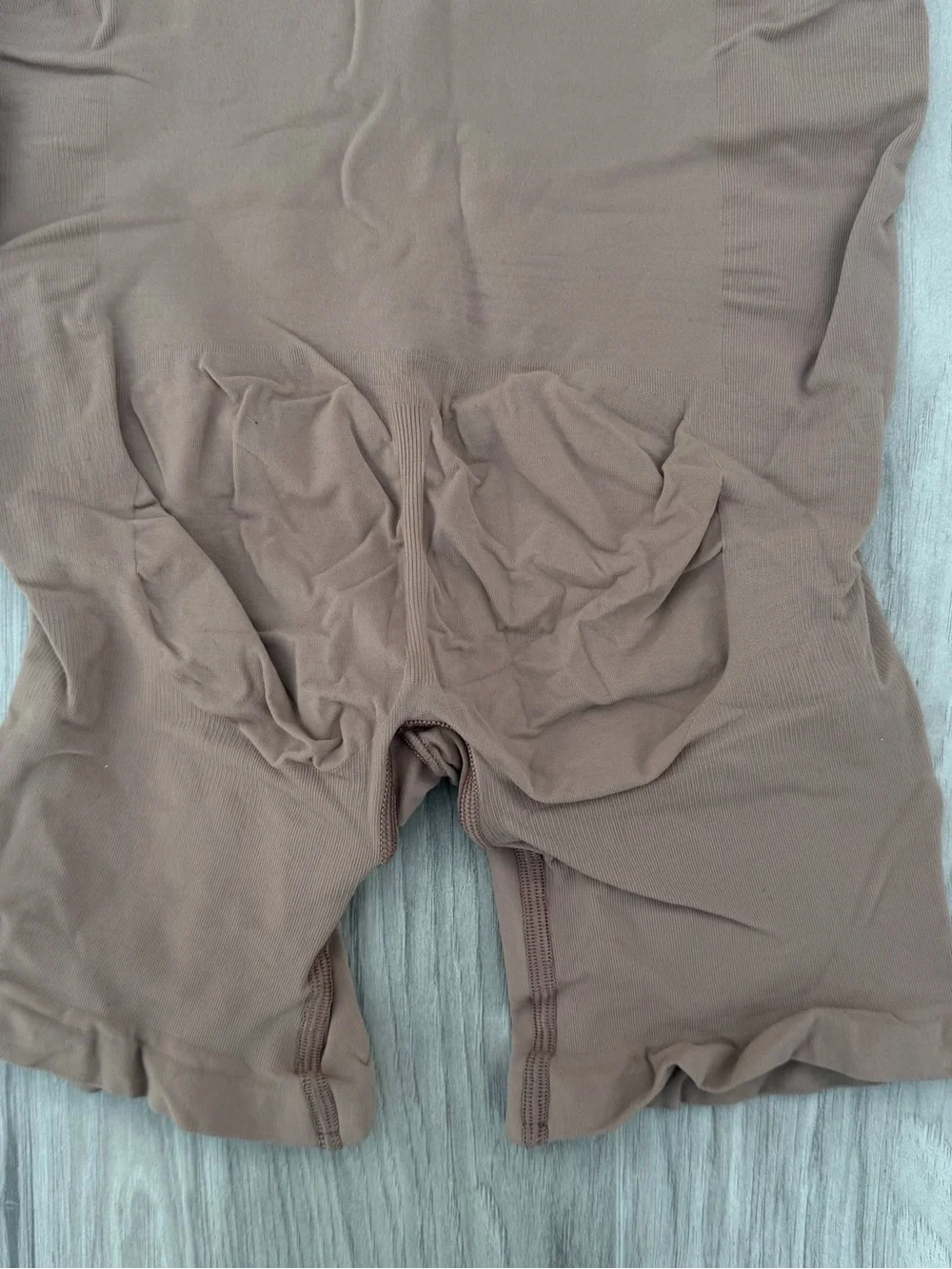 SKIMS Seamless Sculpting Bodysuit in Mocha Brown
